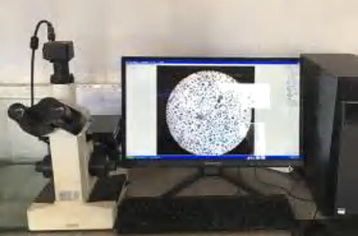 Metalloscope inspection equipment photo with microstructure display